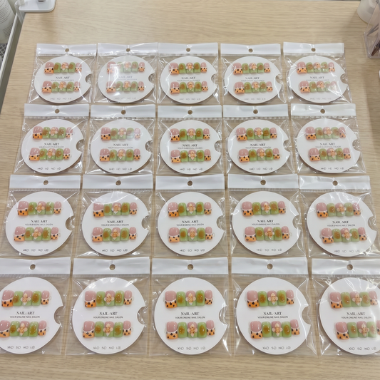 Full set of olive green and orange leopard 3D floral square press on nails displayed on size cards.
