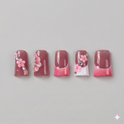 Berry red French tip square press on nails featuring hand-painted white cherry blossoms and a 3D white blooming flower.