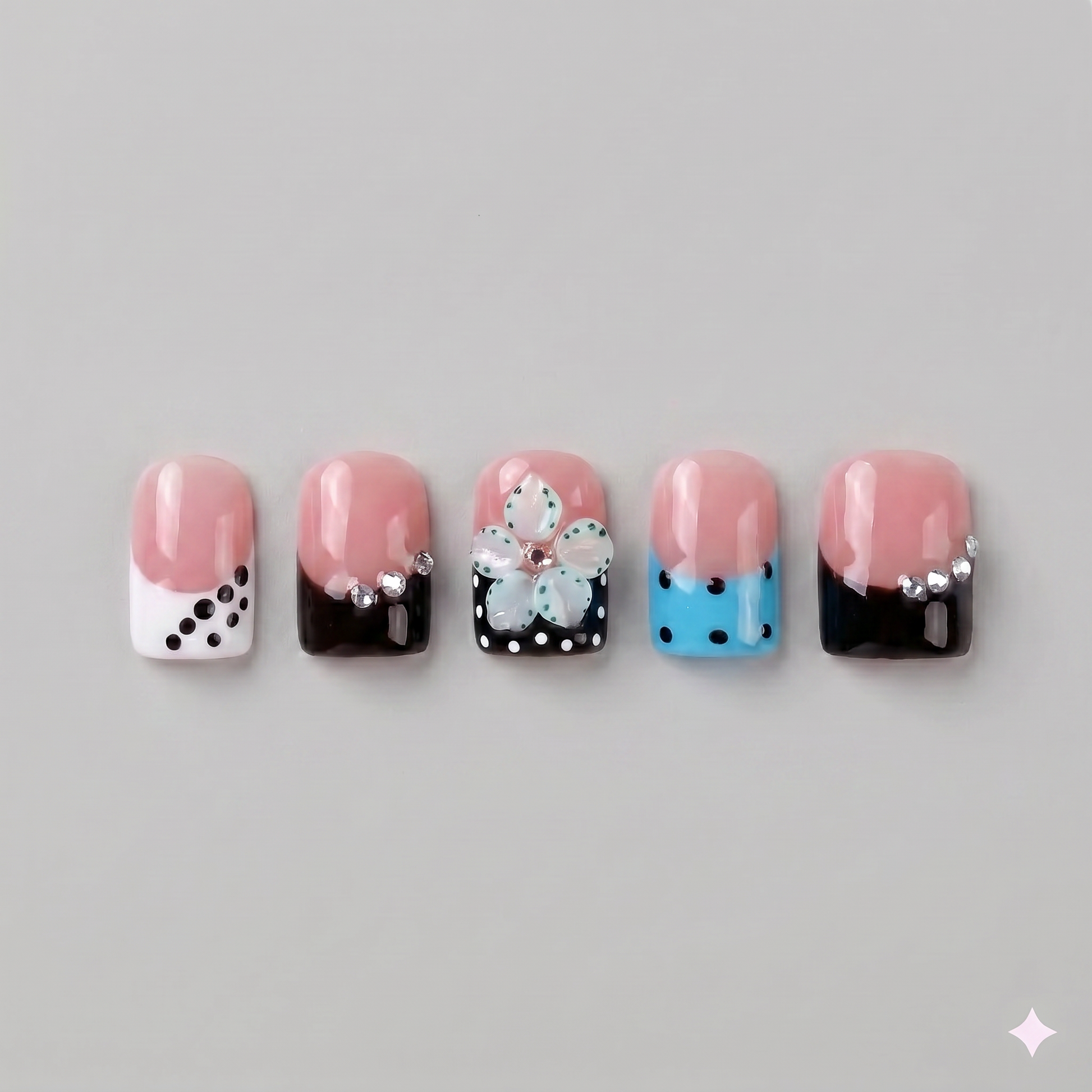 Black checkerboard square press on nails featuring striking black French tips, a statement 3D black ribbon bow, and delicate pearl accents.