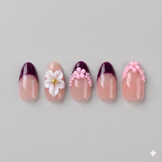 Burgundy French tip almond press on nails featuring delicate 3D white blooming flowers, elegant pearls, and subtle rhinestones.