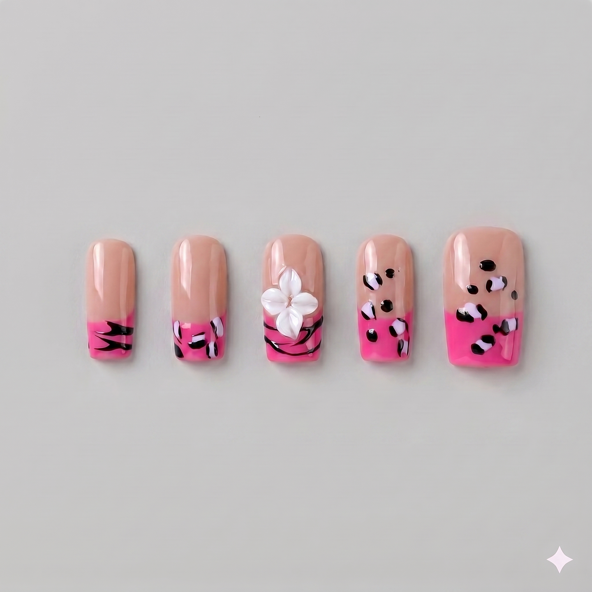 Hot pink cheetah print square press on nails featuring a statement 3D white blooming flower and edgy black animal print spots.