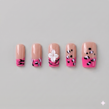 Hot pink cheetah print square press on nails featuring a statement 3D white blooming flower and edgy black animal print spots.