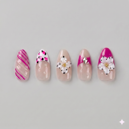 Hot pink floral almond press on nails featuring eye-catching French tips, playful swirls, and delicate white daisies with pearl centers.