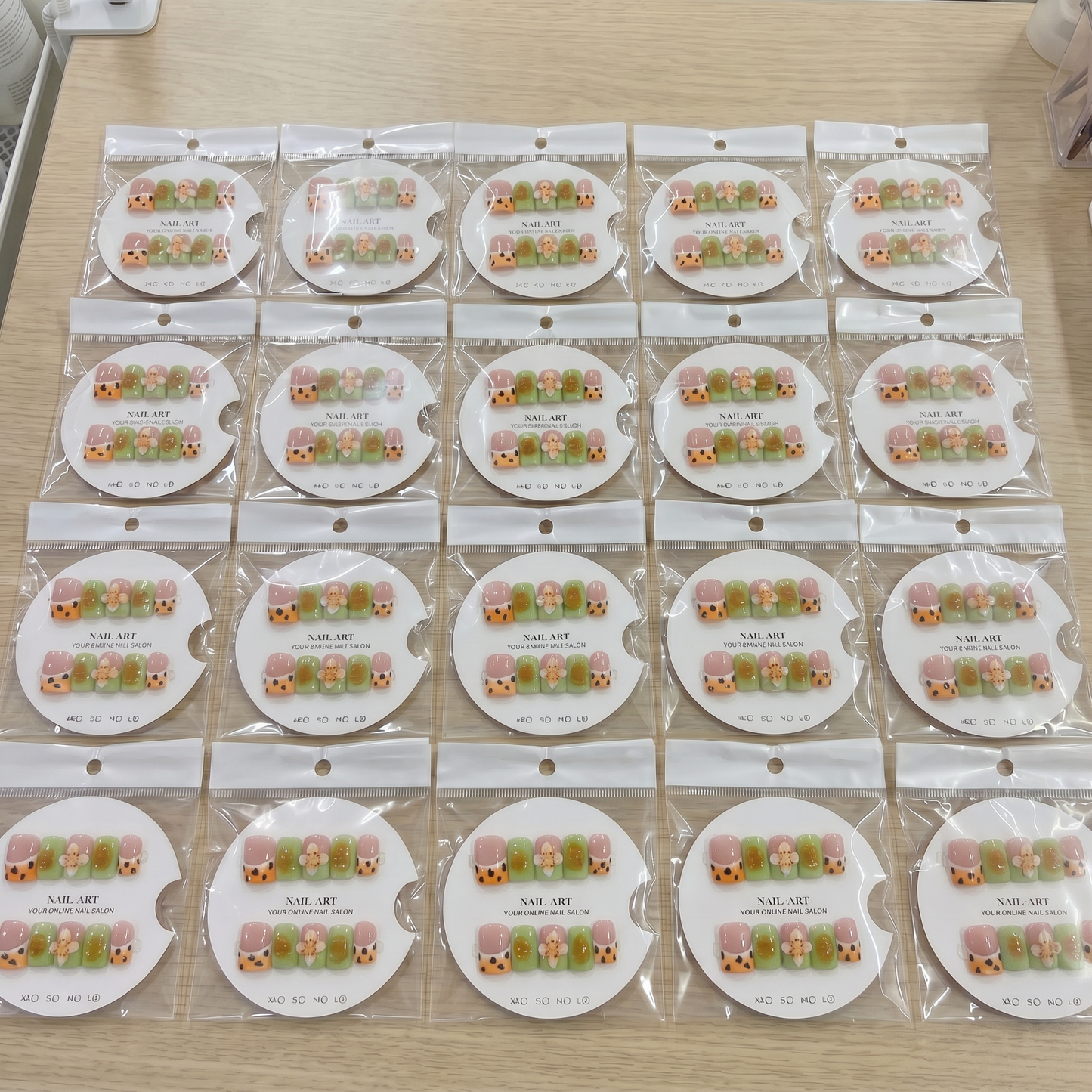 Full set of olive green and orange leopard 3D floral square press on nails displayed on size cards.