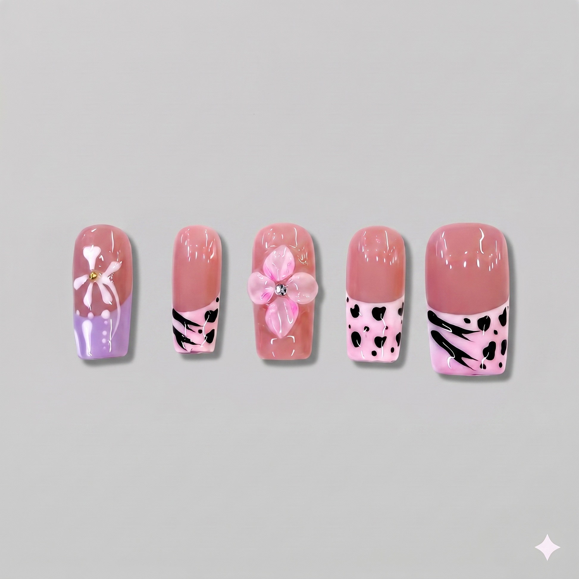 Pink animal print square press on nails featuring a 3D pink blooming flower, a purple ribbon bow, and edgy black zebra and cheetah patterns.